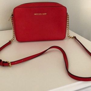 Red Michael Kors cross body bag